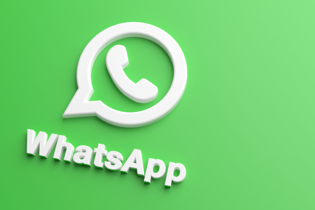 Imagem de fundo verde com a logo do WhatsApp para representar como fazer um anúncio com botão para o WhatsApp.