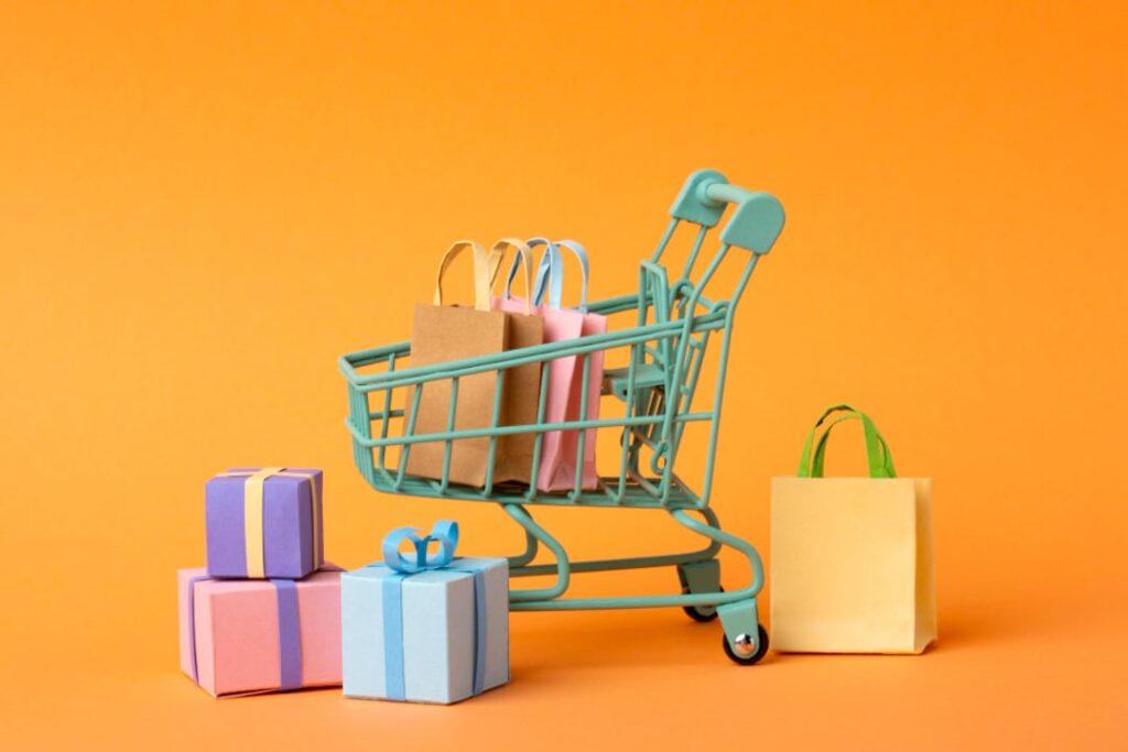 vetor de carrinho de compras com diversas sacolas e presentes ao redor para a black friday 2023