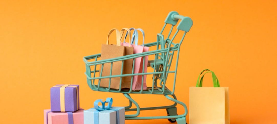 vetor de carrinho de compras com diversas sacolas e presentes ao redor para a black friday 2023