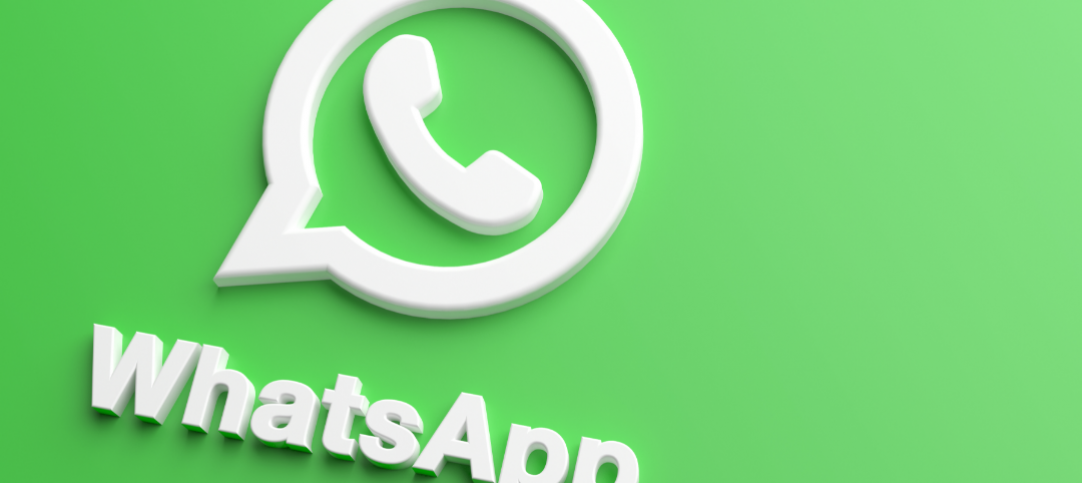 como fazer um anúncio com botão para o WhatsApp Imagem de fundo verde com a logo do WhatsApp para representar como fazer um anúncio com botão para o WhatsApp.